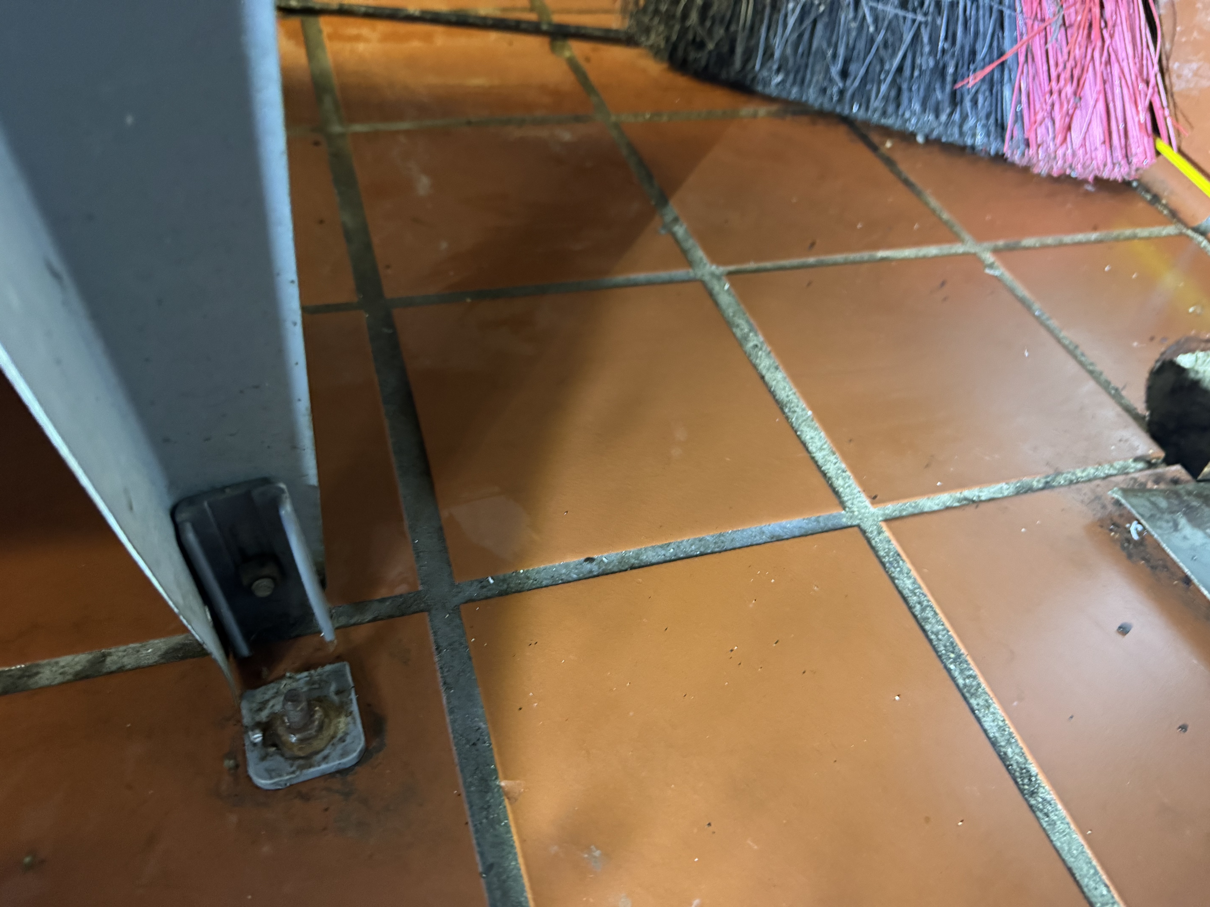 Failed leaking flexible corrugated drain hose connector before plumbing repair