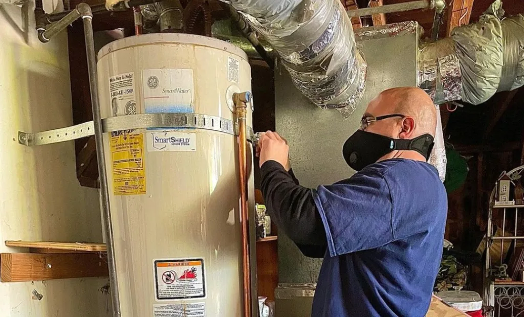 Plumber diagnosing water heater issues in San Francisco